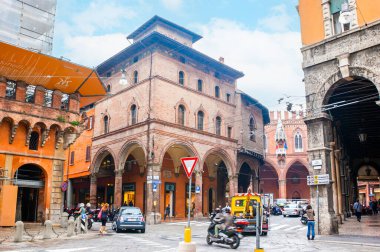 BOLOGNA, ITALY - SEPTEMBER 24, 2017: Piazza Ravegnana with medieval buildings and Palazzo della Mercanzia in background, on September 24 in Bologna, Italy clipart