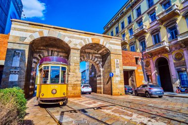 MILAN, ITALY - APRIL 11, 2022: Inner facade of the Porta Nuova Medieval Gate on Via Alessandro Manzoni, on April 8 in Milan, Italy clipart