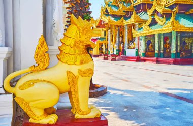 Shwedagon Zedi Daw, Yangon, Myanmar 'ın İmaj Evi girişindeki altın çin heykeli (leogryph)