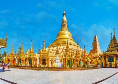 Shwedagon 'un Panorama' sı ana tapınağıyla birlikte, Yangon ve Myanmar 'ın etrafını saran yüzlerce küçük süslü stupanın arkasında yükseliyor.