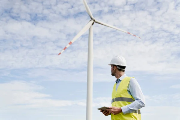 Caucasian Engineer Holding Digital Tablet Turning Wind Turbine — Stock Photo, Image