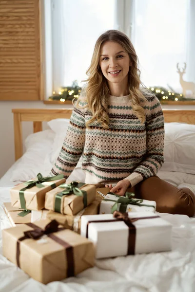 Portrait Cheerful Caucasian Woman Sitting Bed Christmas Gifts — Stock Photo, Image