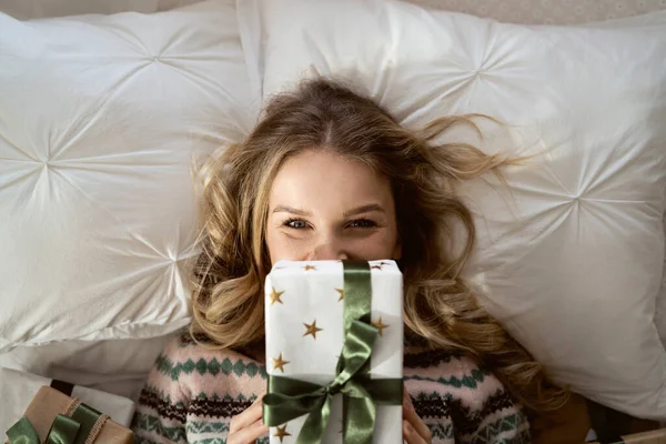 Top View Portrait Cheerful Caucasian Woman Covering Face Christmas Gift — Stock Photo, Image