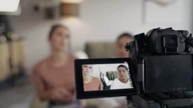 Selective focus on two female vloggers recording a movie. Shot with RED helium camera in 8K. 