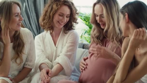 Group Smiling Adult Women Baby Shower Touching Bell Pregnant Woman — Stockvideo