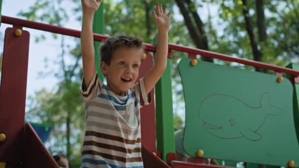 Caucasian Boy Playing Sliding Summer Day Shot Red Helium Camera — Video Stock
