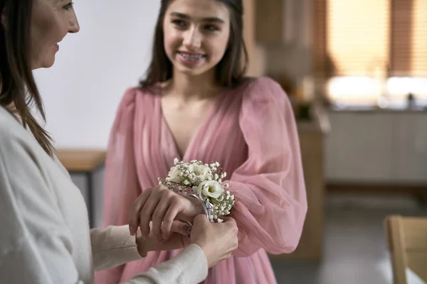 Caucasian Mother Giving Corsage Hand Her Daughter — Stock Photo, Image