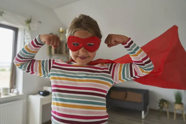 Caucasian Girl Wearing Superhero Costume Showing Strength — Stock Photo, Image