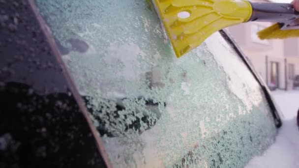 Man Removing Ice Car Window Shot Red Helium Camera — Stock Video