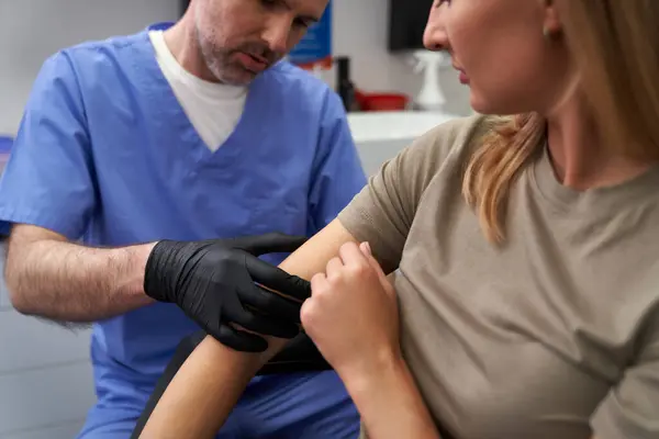 Doctor Checking Mark Woman Arm Stock Picture