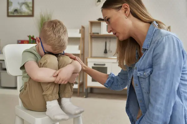 Sad Little Boy Therapist Consoling Him Royalty Free Stock Images