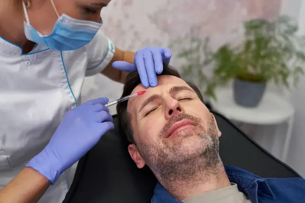 Man Having Facelifting Procedure Beauty Salon Stock Image