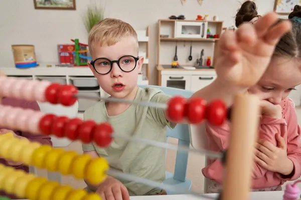 Preschool Children Using Abacus Learn Stock Picture