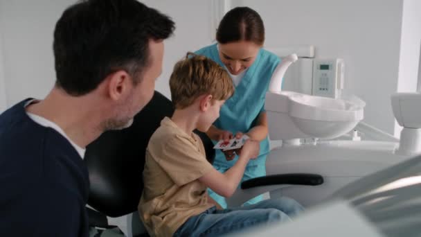 Little Boy Getting Sticker Dentist Appointment — Stock Video