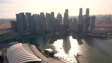 Sunny day in Singapore. Panorama of the city center with Marina Bay and skyscrapers. High shooting point
