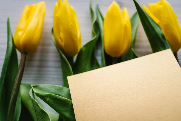 Postcard Yellow Tulips Wooden Background Space Message Greeting Card Concept — Zdjęcie stockowe