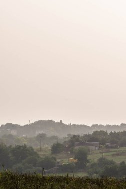 Landscape of Ukraine. Day and Night . Sunrise in forest . Village house .