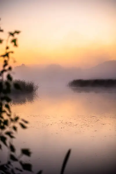 stock image beautiful sunrise over a lake