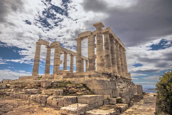 stock image Sounion, Greece, May 4th 2024: The legendary Temple of Poseidon in Sounion cape, Greece