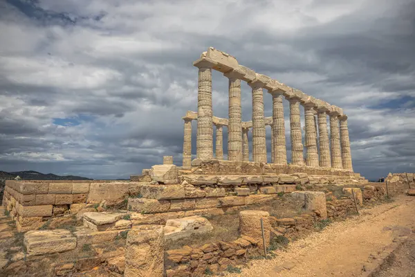 stock image Sounion, Greece, May 4th 2024: The legendary Temple of Poseidon in Sounion cape, Greece