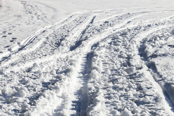 Traces of snowmobile on the snow. Graphic resources