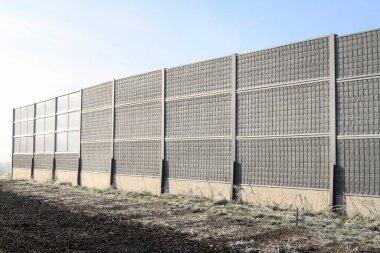 Sound barriers along a noisy highway.