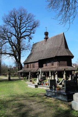 St. Leonard's Church and ancient cemetery in Lipnica Murowana. clipart