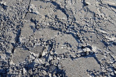 Parçalanmış beton kaldırım. Pürüzlü yapı. Grafiksel kaynaklar