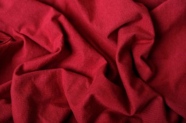 Yumuşak kırmızı kumaş, moda arka planı. Grafiksel kaynaklar