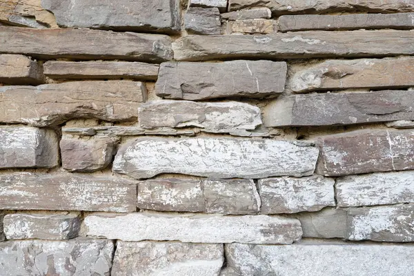 Taştan kale duvarı. Grafiksel kaynaklar