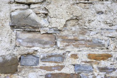 Taştan yapılmış eski bir duvar. Grafiksel kaynaklar