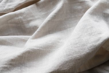 Dalgalı keten kumaşlı soyut bir arka plan. Grafiksel kaynaklar