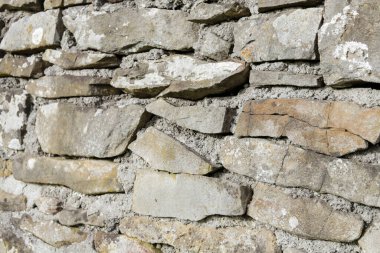 Kumtaşından yapılmış eski kalenin duvarı. Grafiksel kaynaklar