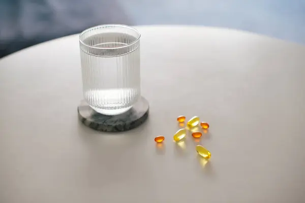 Glass Water Omega Vitamins Table Selective Focus Home Interior Background Obrazek Stockowy