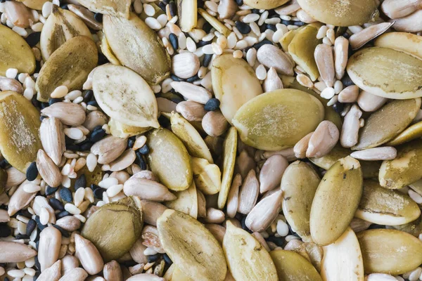 stock image Seed mix with sesame seeds, poppy seeds, pumpkin seeds and sunflower seeds. Background of pumpkin seeds, sunflower and sesame