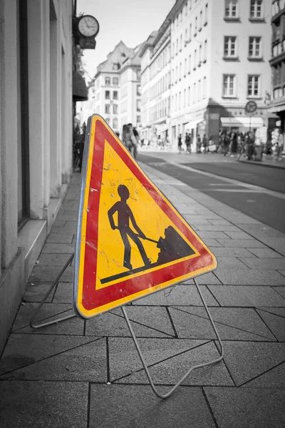 Construction site sign on a footpath in the old town of Strasbourg in France