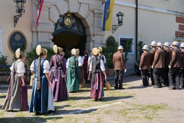  Duernstein, Austria  June 16, 2022: The traditional costume group Duernstein during a procession on Corpus Christi in front of the castle of Duernstein                              