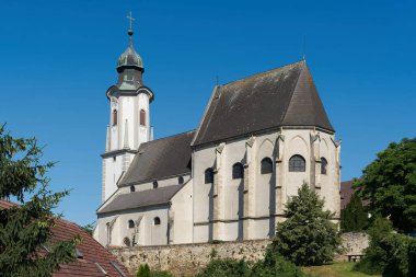 The parish church of St. Nicholas one of the sights high above, above the municipality of Emmersdorf in Austria                               