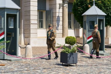 Budapest, Hungary  June 17, 2022: Palace guard at the Budapest Castle Palace, Budavri Palota, the seat of the President on Castle Hill in the Buda district of Budapest                               