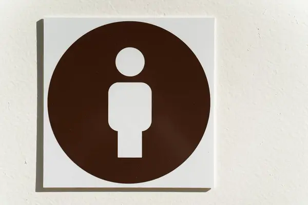 Toilet for men with the symbol of the man on the entrance door