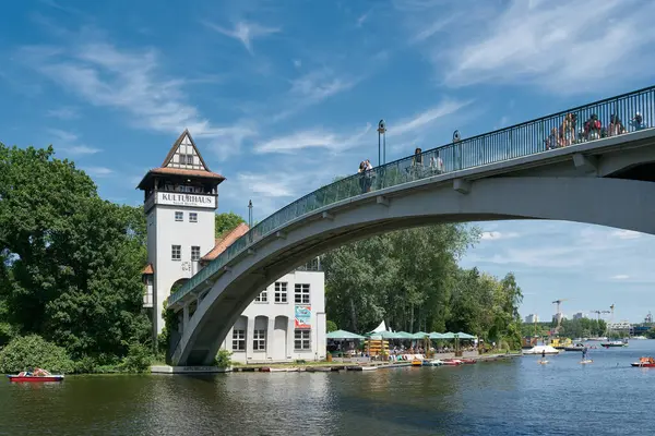  Berlin, Germany  June 03, 2023: Abteibruecke, Abbey Bridge to the Kulturhaus Insel, a popular venue in the middle of the River Spree in Berlin's Treptow district                              