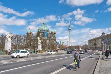  Berlin, Germany  March 28, 2024: Street scene in Berlin-Mitte with Berlin Cathedral and television tower in the background                               clipart