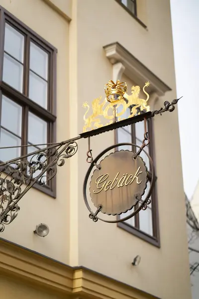 stock image  Bakers' guild sign with the German inscription Gebck in the city center of Berlin. Translation: Pastry                               