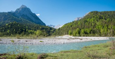 wild landscape Risstal cold Rissbach river, tirolean alps in spring. 