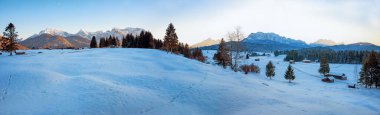 beautiful winter landscape panorama Buckelwiesen, upper bavaria near Krun, at dawn