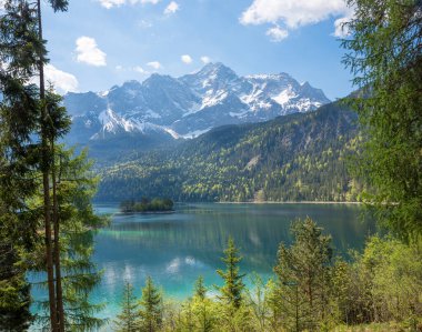 pictorial bavarian alpine landscape, view to lake Eibsee and Zugspitze mountain upper bavaria