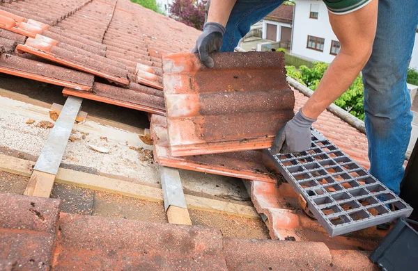 Worker Rooftop Replacing Broken Tiles New Shingles Closeup Shot Stock Picture