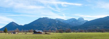 landscape panorama Bad Feilnbach, rural fields and alps view upper bavaria clipart