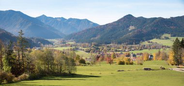 autumnal landscape around tourist resort Fischbachau, upper bavaria and mountain view  clipart