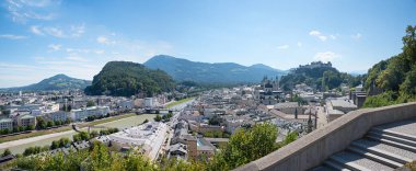 Viewpoint on the Monchsberg with a view of the Hohensalzburg Fortress and the old town of Salzburg, Salzach river, austria. clipart